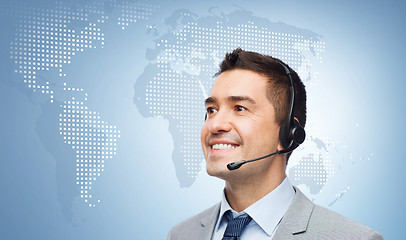 Image showing smiling businessman in headset