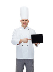 Image showing happy male chef cook showing with tablet pc