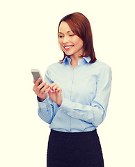 Image showing young smiling businesswoman with smartphone