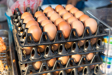 Image showing fresh eggs on tray at asian street market