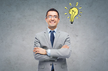 Image showing happy smiling businessman in eyeglasses and suit