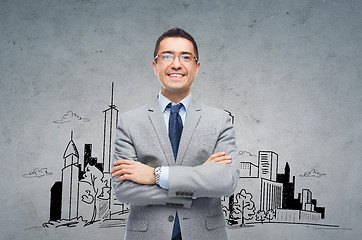 Image showing happy smiling businessman in eyeglasses and suit