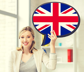 Image showing smiling woman with text bubble of british flag