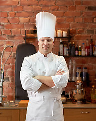 Image showing happy male chef cook in restaurant kitchen