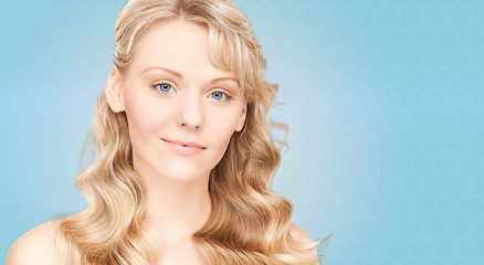 Image showing beautiful young woman face with long wavy hair