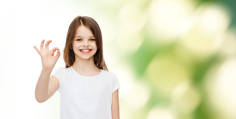 Image showing smiling little girl in white blank t-shirt