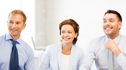 Image showing business team discussing something in office