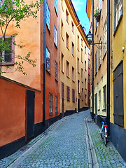 Image showing Narrow street with colorful buildings in Stockholm