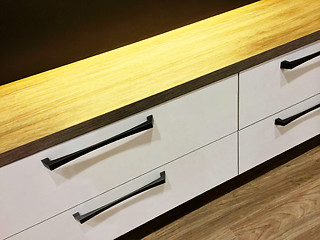 Image showing Modern chest of drawers with wooden top