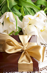 Image showing  gift and white tulips