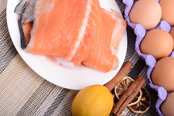 Image showing Slice of red fish salmon with fruits