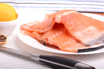 Image showing Fresh uncooked red fish fillet slices