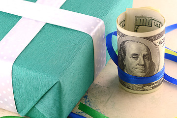 Image showing american money dollars and green gift box