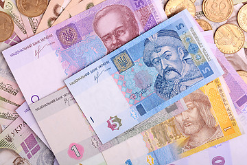 Image showing Pile of Ukrainian money, isolated on white