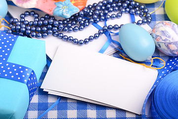 Image showing Colorful Easter Eggs with ribbon on the white background