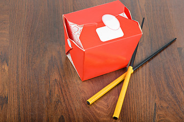 Image showing Chinese take away red food box with chopstocks