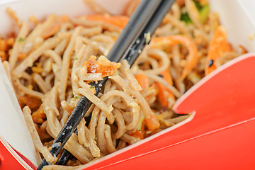 Image showing Noodles in red take away container