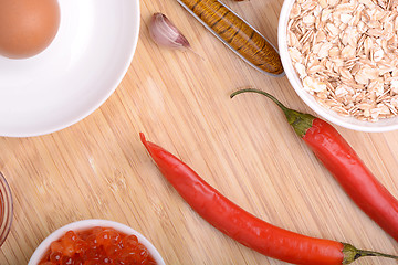 Image showing bowl of corn flakes and red pepper