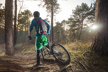 Image showing Mountain biker is ready to take an off road trail