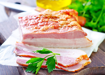 Image showing Pieces of smoked pork bacon