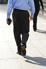 Image showing Business people walking