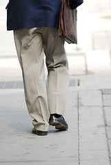 Image showing Businessman walking