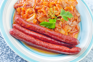 Image showing fried cabbage with sausages