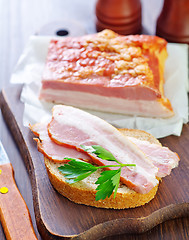 Image showing Pieces of smoked pork bacon