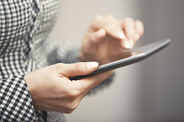 Image showing Womanworking with digital tablet indoors