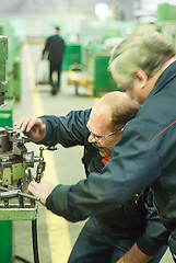 Image showing Industrial workers working in plant, teamwork