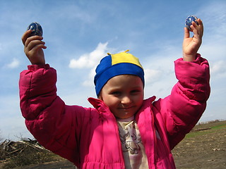 Image showing girl with Easter eggs in hands