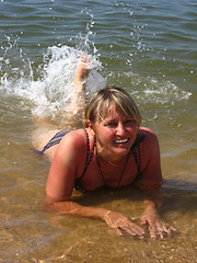 Image showing girl splashing in the sea