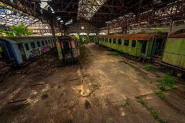 Image showing Cargo trains in old train depot