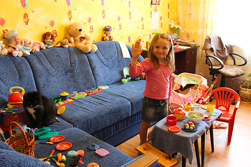 Image showing little girl playing with toys in her room