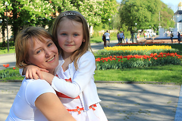 Image showing mother and daughter embrace