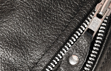 Image showing Part black leather clothing with a zipper. macro