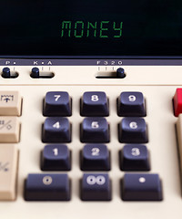 Image showing Old calculator - money