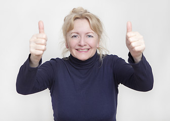 Image showing elderly woman thumbs up