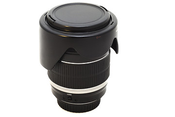 Image showing the lens with the lens hood from the SLR camera on white backgro