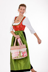 Image showing Swing to the old Bavarian woman in costume