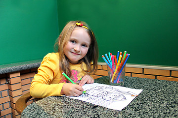 Image showing girl drawing by pencils an image