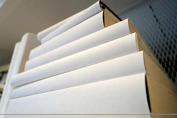 Image showing Wooden book shelf with white books 