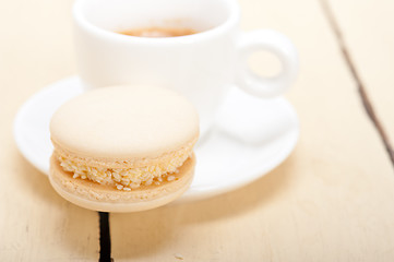 Image showing colorful macaroons with espresso coffee 