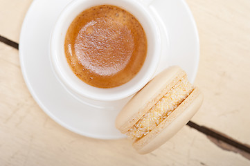 Image showing colorful macaroons with espresso coffee 