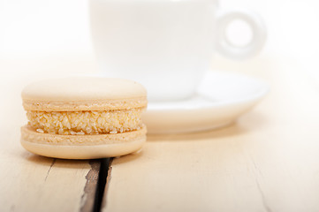 Image showing colorful macaroons with espresso coffee 