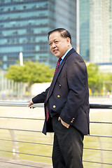 Image showing Asian businessman smiling portrait