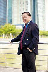 Image showing Asian businessman smiling portrait