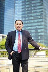 Image showing Asian businessman smiling portrait