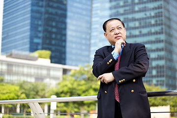 Image showing Asian businessman smiling portrait