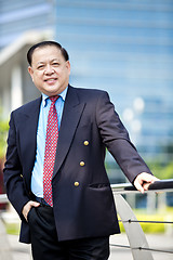 Image showing Asian businessman smiling portrait